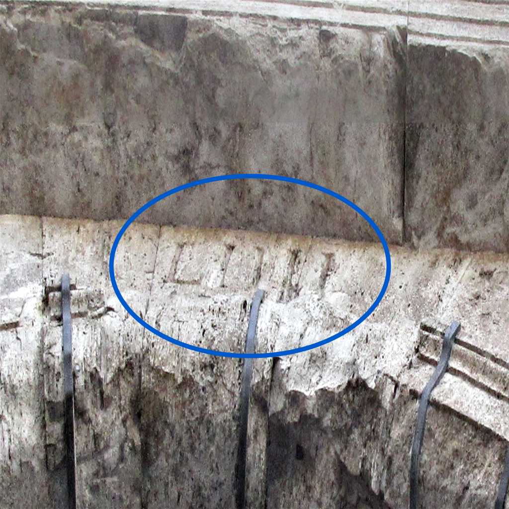 LIIII carved above one of the Colosseum's arched entrances.